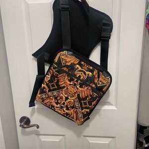 Sprayground Black and Gold Baroque Messenger Bag